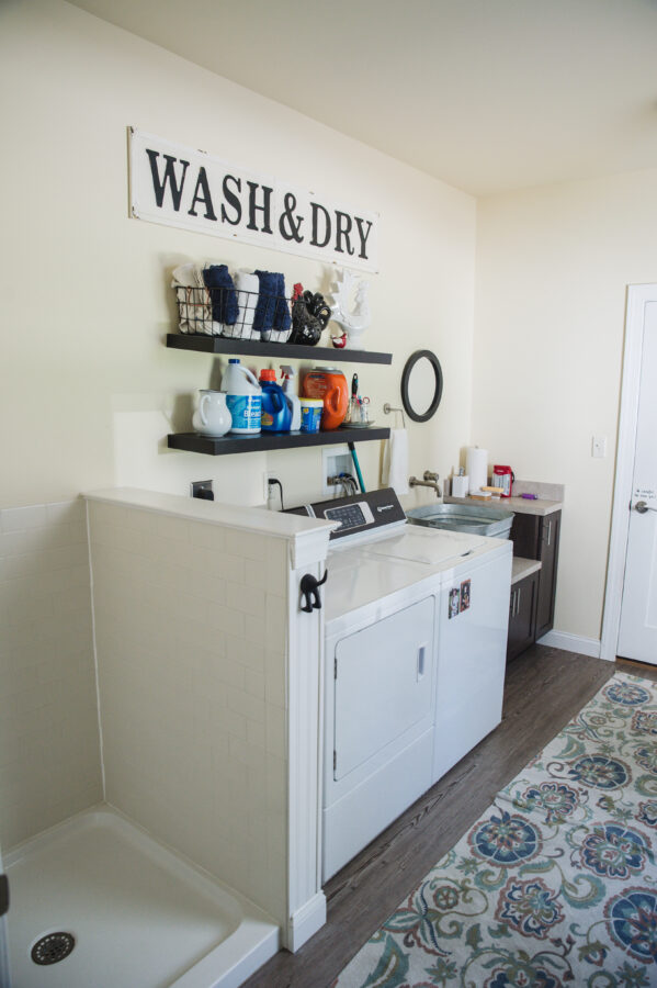 The Laundry/Mudroom with pet wash station, galvanized laundry tub and floating shelves. 
