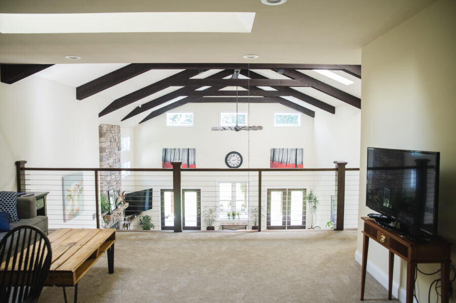 Loft area overlooking great room/dining room and great room ceilings. 