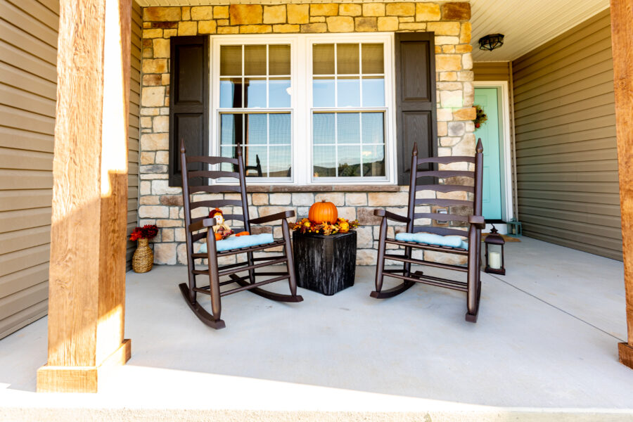 Two rocking chairs on a front porch