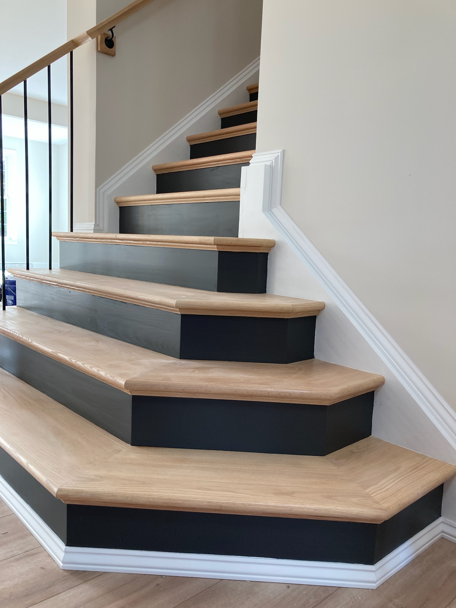 Staircase with black treads